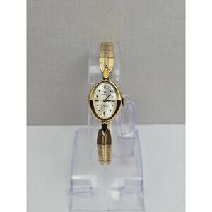Vintage Stellaris 17 Jewels Swiss Made Womens Gold Tone Oval Wind Up Dress Watch